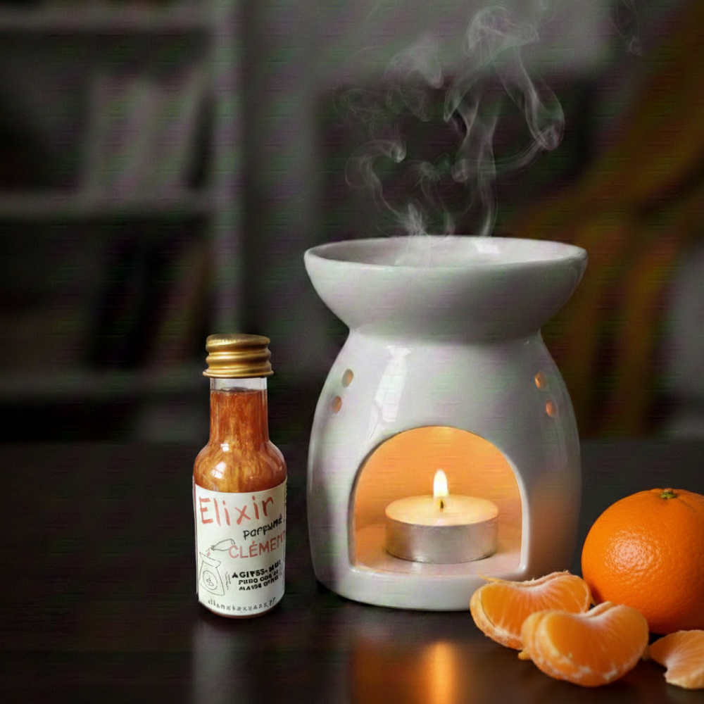 Flacon d'élixir huile naturelle à la Clémentine Allume Tes Sens, concentré de parfum orange aux micas dorés pour brûle-parfum.